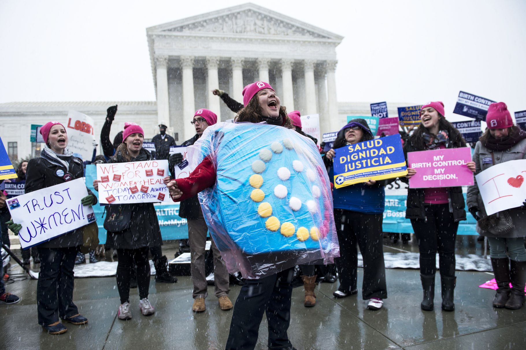 A protester dressed as birth control pills rallies outside the Supreme Court Brendan Smialowski:AFP via Getty Images