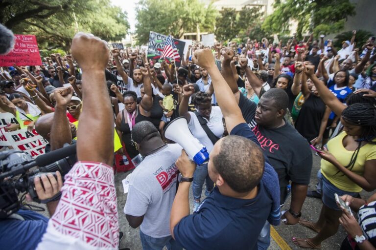 Demonstrators march from Baton Rouge City Hall to the Louisiana Capitol, photo credit Mark Wallheiser:Getty Images