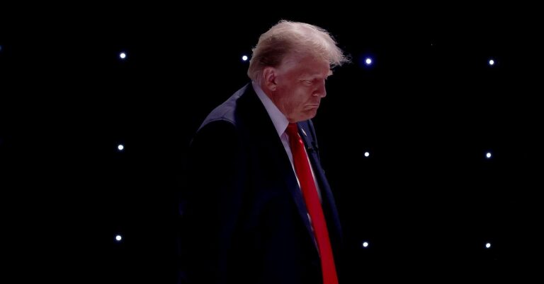 Former President Donald Trump walks back to his podium, credit JUSTIN SULLIVAN:GETTY IMAGES