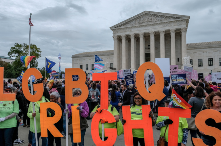 LGBTQ supporters demonstrate outside the U.S. Supreme Court in Washington, D.C., on October 8, 2019, credit ALEX WROBLEWSKI, GETTY IMAGES