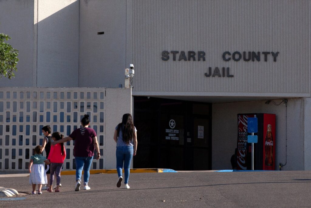 People arrive at the Starr County Jail where Lizelle Herrerra, 26, was charged with murder for allegedly performing what authorities called a “self-induced abortion”, in Rio Grande City, Texas