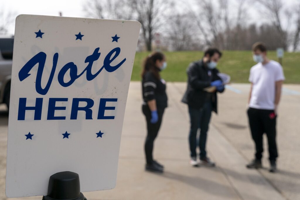 Poll workers in Wisconsin during 2020 curbside voting in Madison, Wisconsin Andy Manis, Getty Images