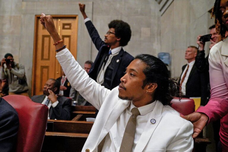 Rep. Justin Pearson and Rep. Justin Jones raise their fists, Credit, Cheney Orr, Reuters