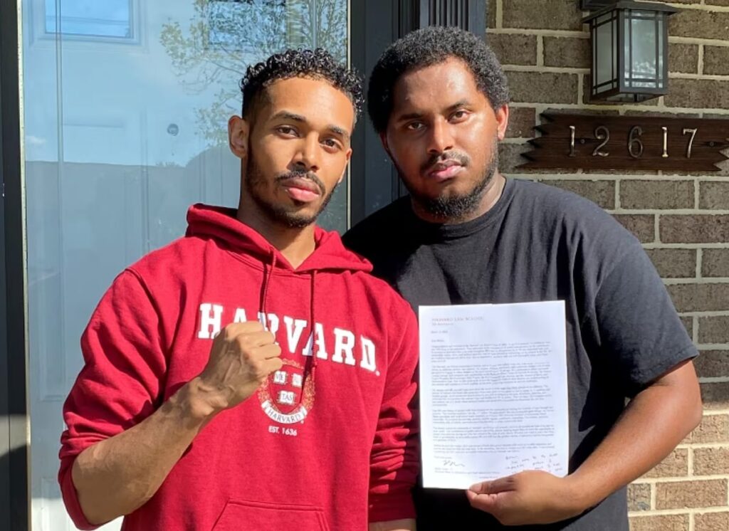 Staton with his brother Reggie after he was accepted to Harvard Law School in March 2020, credit Washington Post