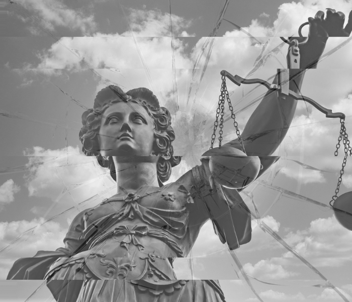 Statue of Justice broken into pieces