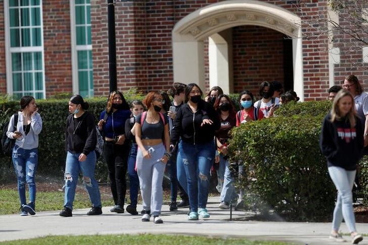 Students walking out of school building, credit REUTERS, Octavio Jones
